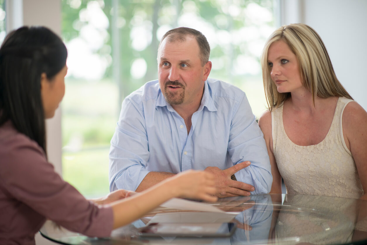 young couple with estate planning attorney
