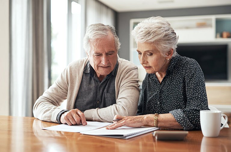 older couple looking over estate plan