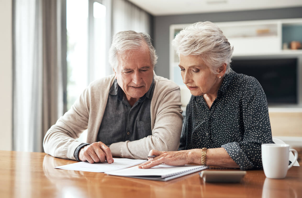 older couple looking over estate plan