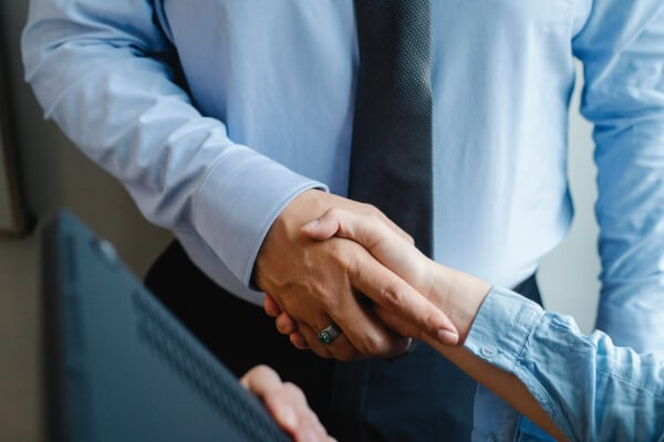 Revocable trust lawyer shaking hands
