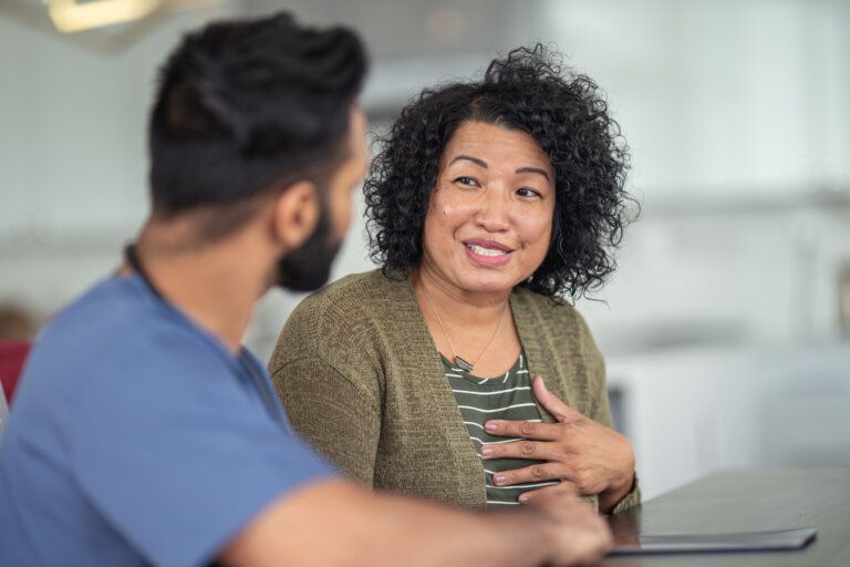 woman speaking with a doctor