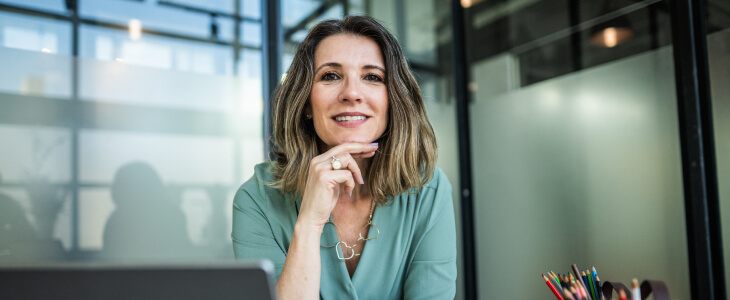 Gen X business woman at her desk