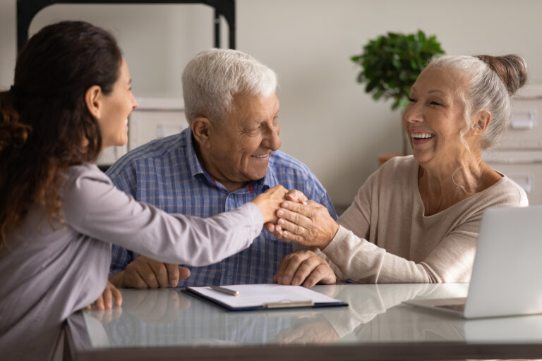 Senior couple meeting with a MassHealth planning attorney