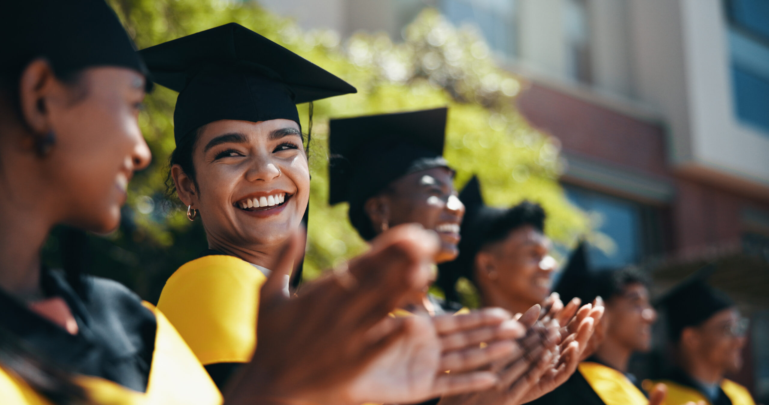 A new graduate celebrating with family