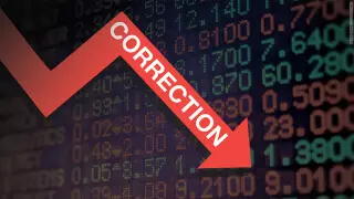 Stock market numbers with a red downward Correction arrow