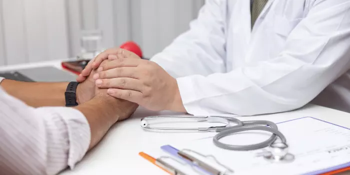 doctor comforting a patient