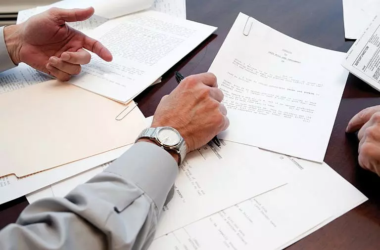Man Signing his will