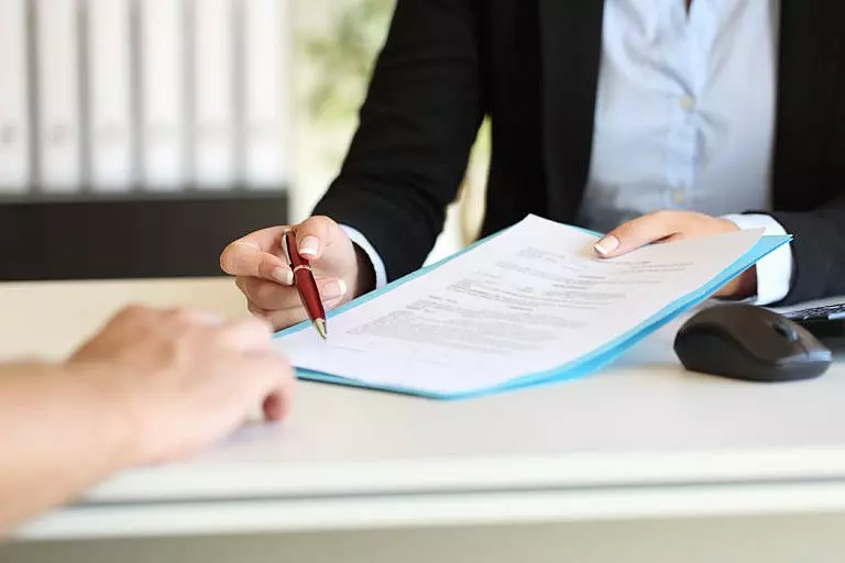 Client sitting with estate planning attorney