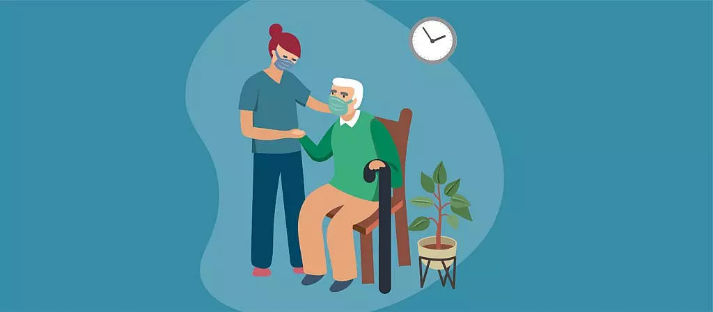 Person with a mask visiting an elderly person. Maybe the elderly person is in a wheelchair