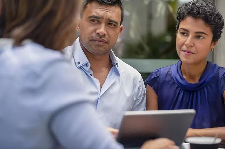 parents discussing their estate plan with attorney