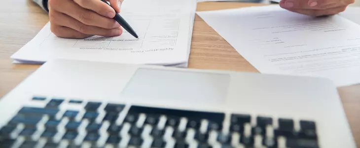lawyer looking at documents on his desk