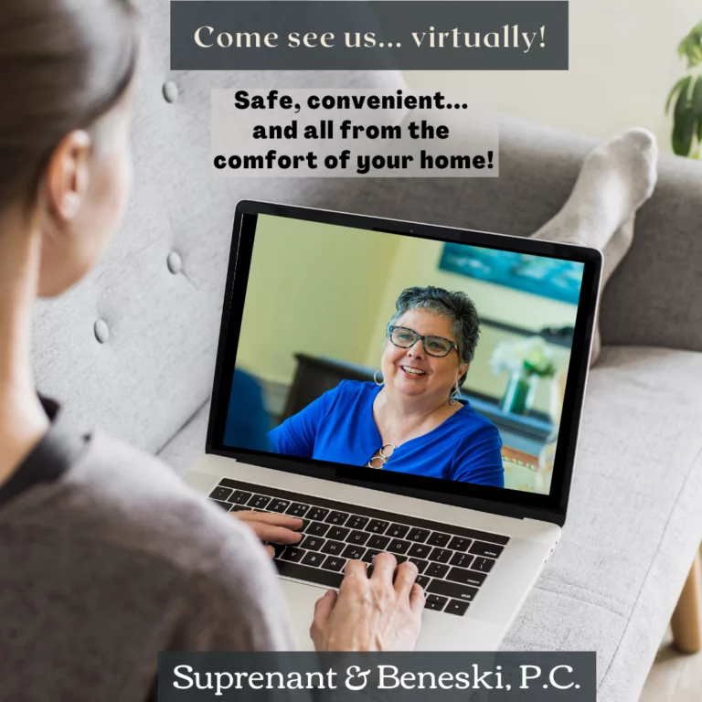a lawyer meeting with a client through a computer