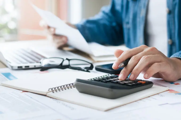 man calculating estate tax