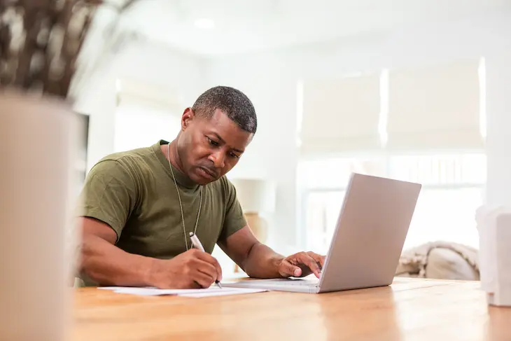middle aged man working on estate planning