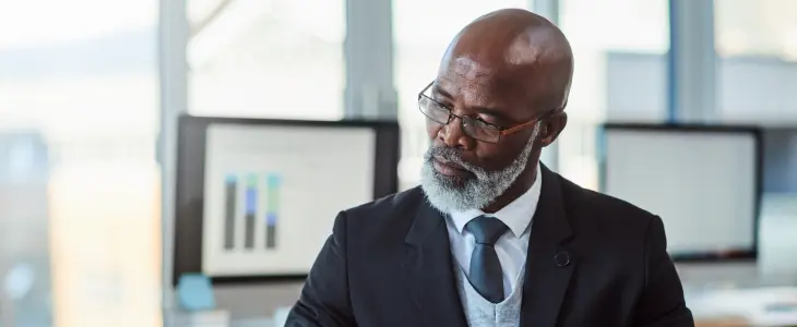 Businessman in a nice suit working at a desk