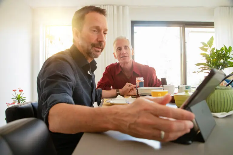 LGBTQIA+ seniors reviewing documents