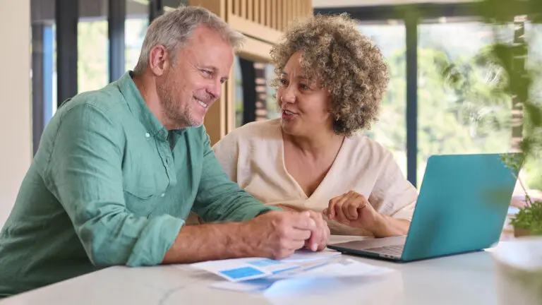Man and woman creating a trust online